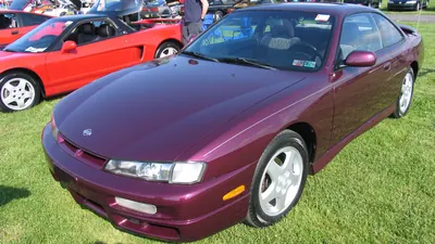 Photo of a Nissan 240SX SE coupe (S14), purple, an example of the Nissan 240SX (S14, 1995-1998)